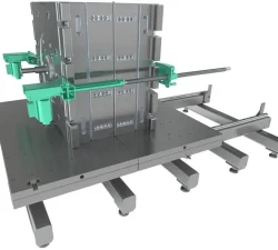 Grüne Gewindespindeln spannen eine geschlossene Werkzeugform auf einer Metallplattform mit Führungen.
